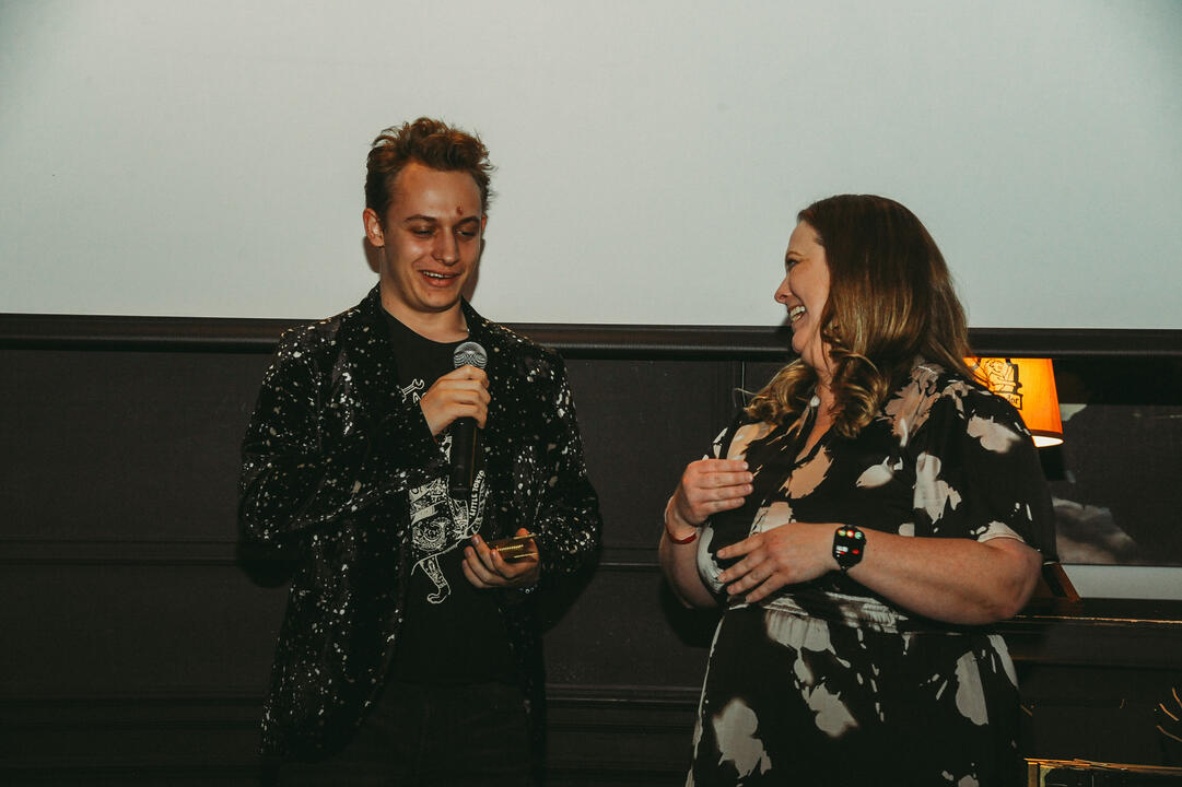 JoJo Scanlon accepting the Nevada Filmmaker Award from Nevada Film Board Director Kim Spurgeon at the C-47 Film Festival